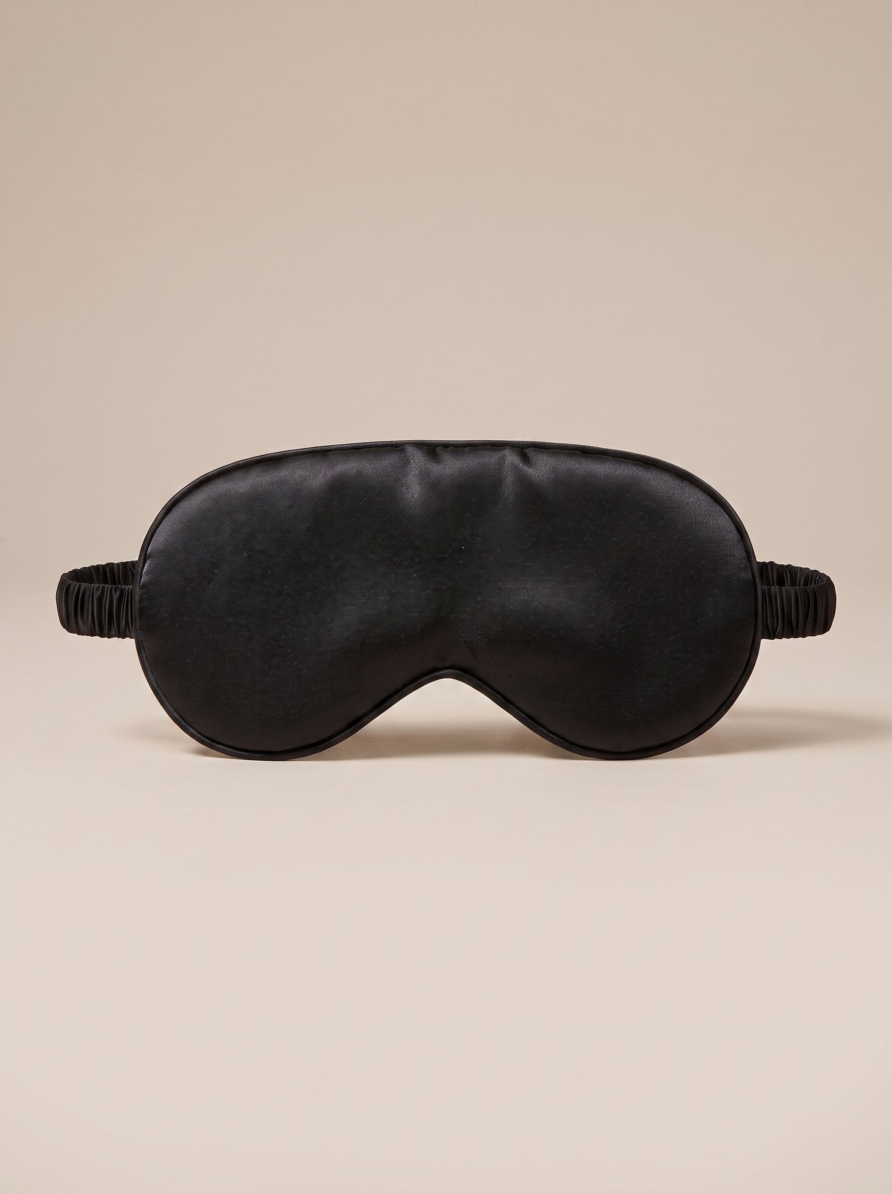 Nuit Sleep Mask in black, satin sleep mask with a contoured nose panel and adjustable strap