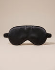Nuit Sleep Mask in black, satin sleep mask with a contoured nose panel and adjustable strap