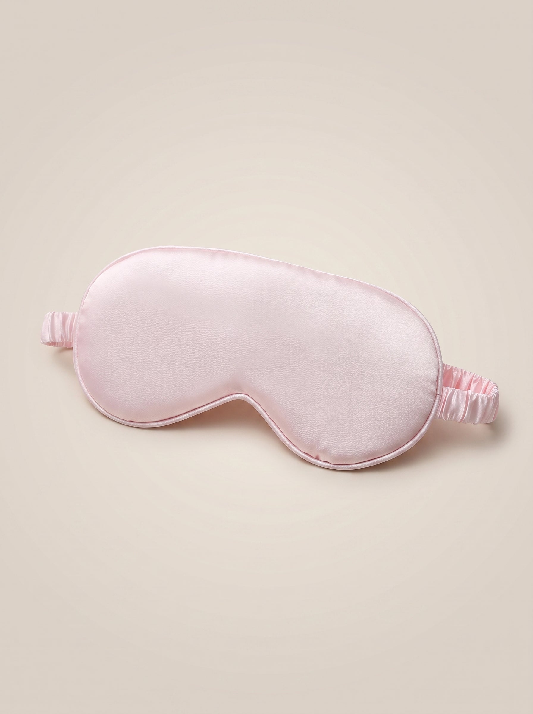 Nuit Sleep Mask in blush pink, satin sleep mask with a contoured nose panel and adjustable strap